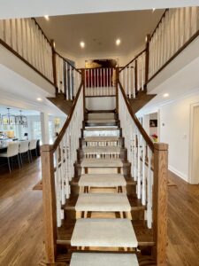 Should You Paint Wood? Here is a before picture of an unpainted staircase.